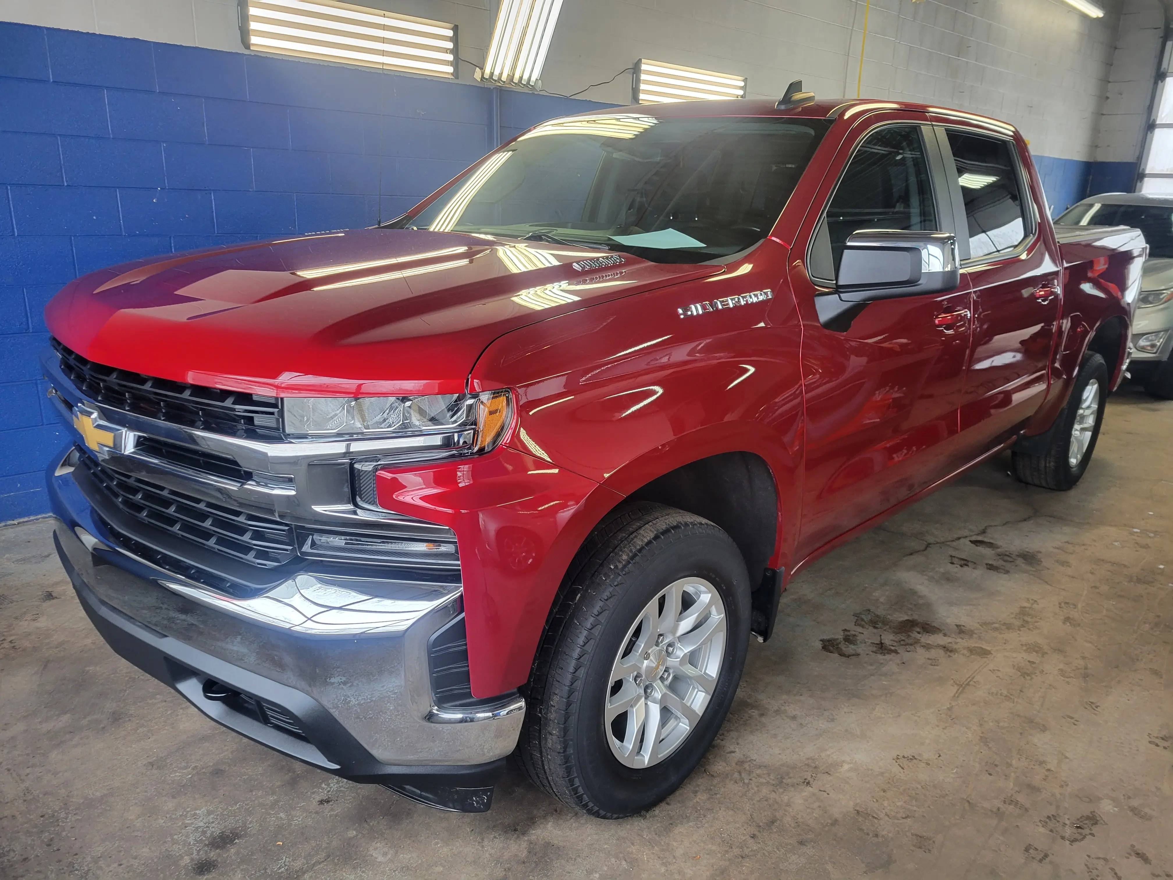 The same Chevrolet Silverado after detailing, fully cleaned and polished