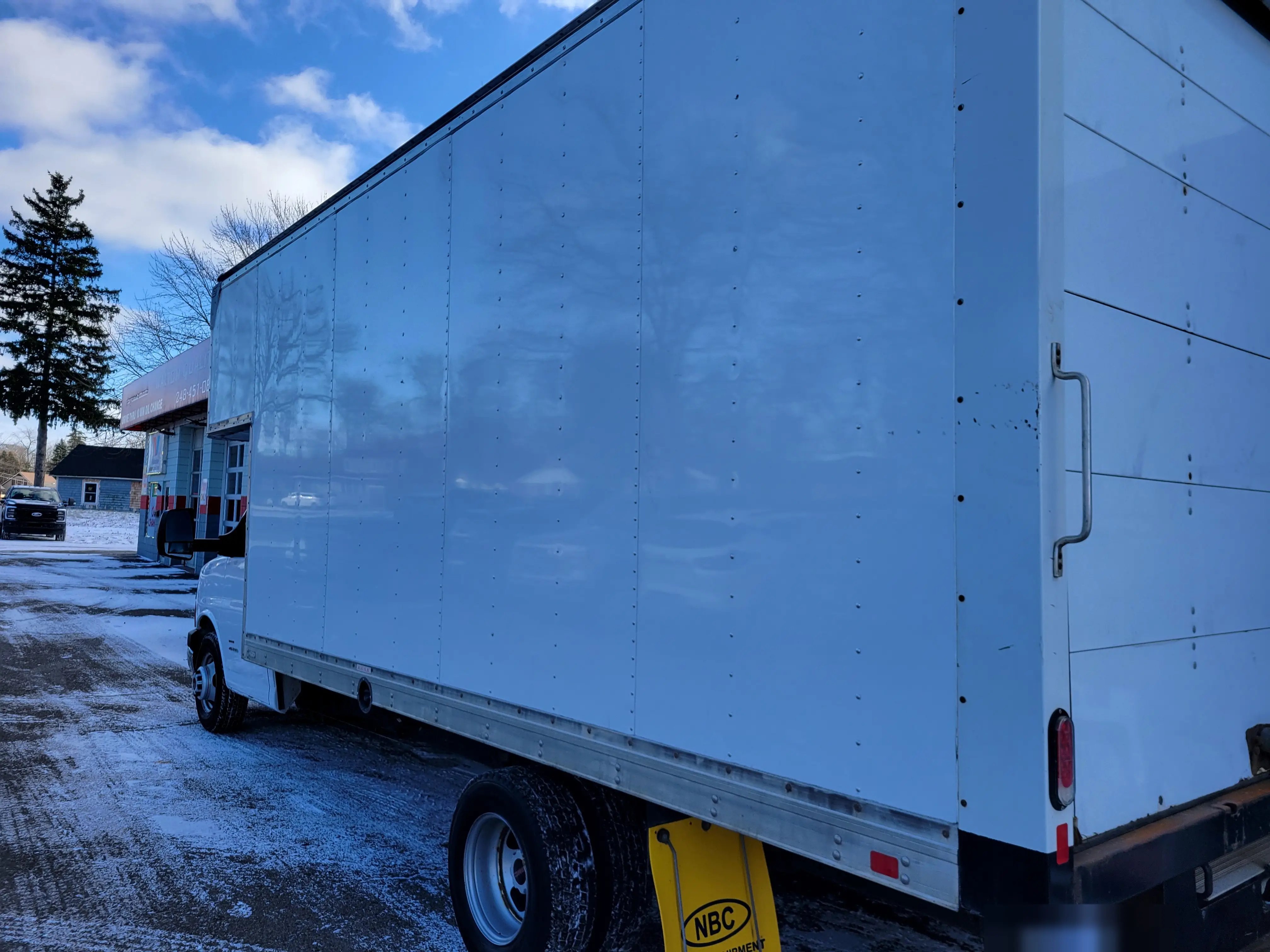 A box truck after full wrap and decal removal