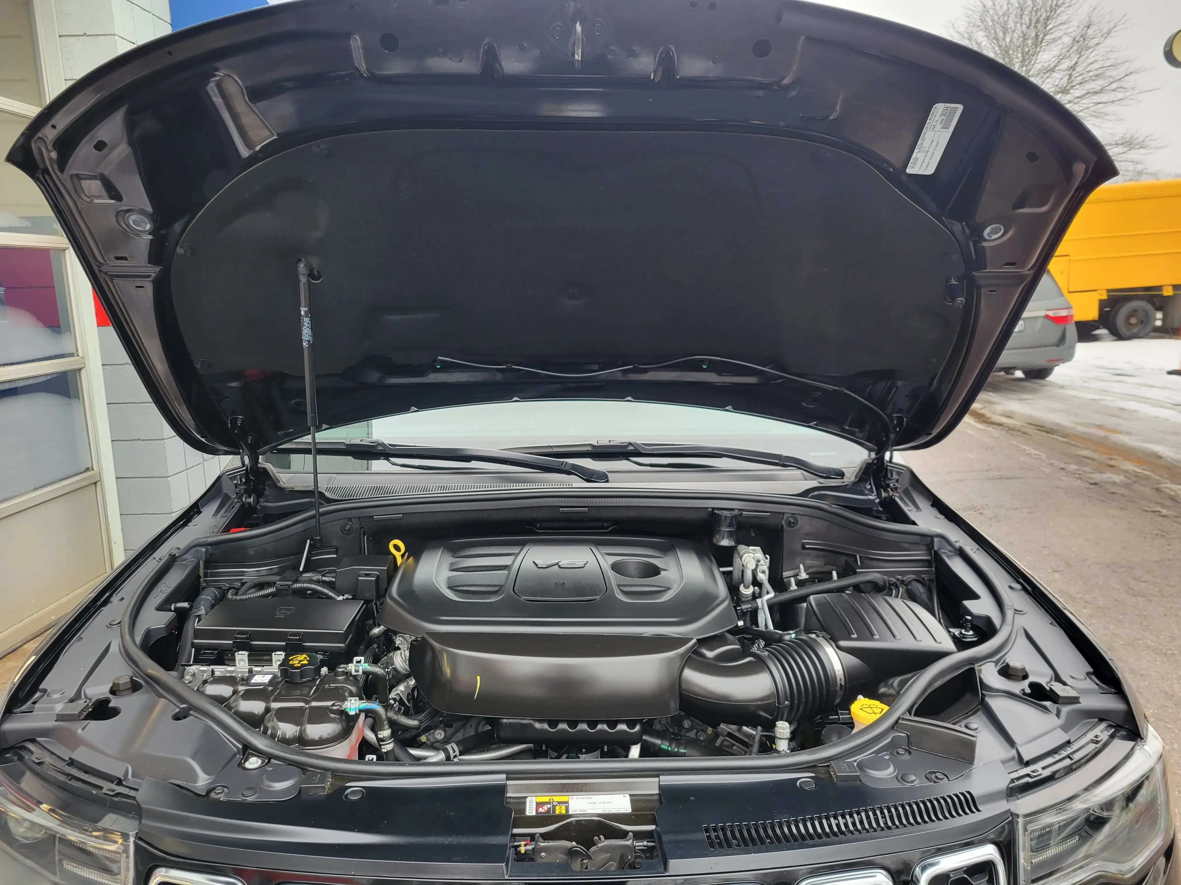 A cleaned engine bay after an engine detail