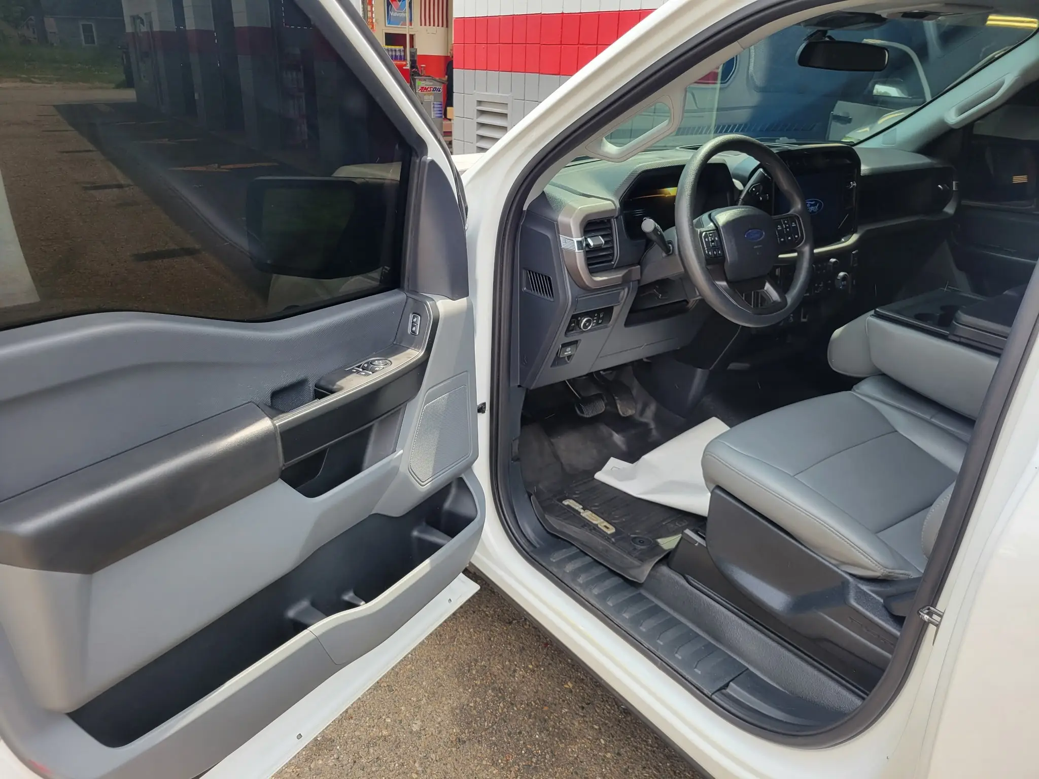 The cleaned interior of a Ford F-150 detailed before sale at Fast Track Detailing Solutions